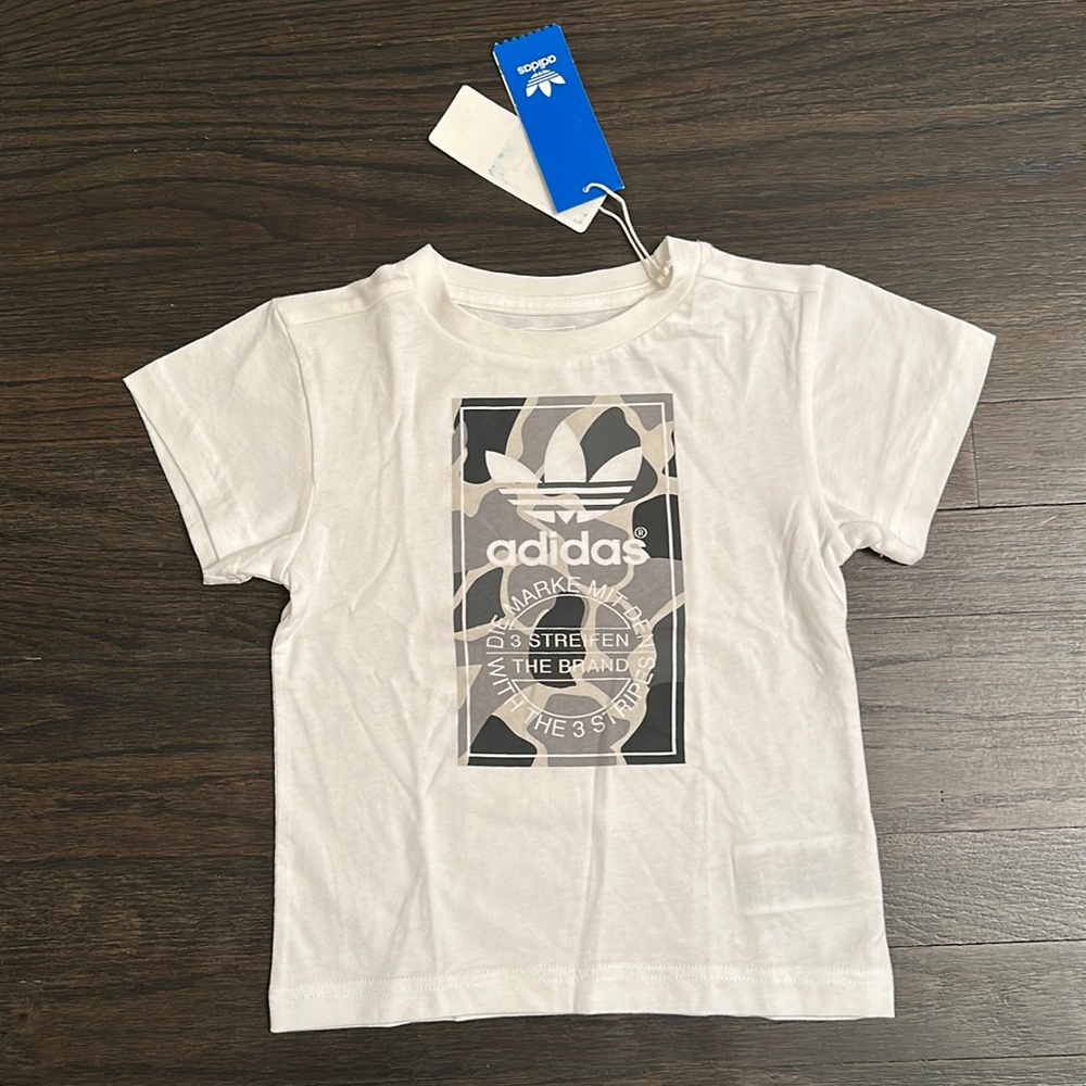 Adidas original small tee. 4 to 5 years old.